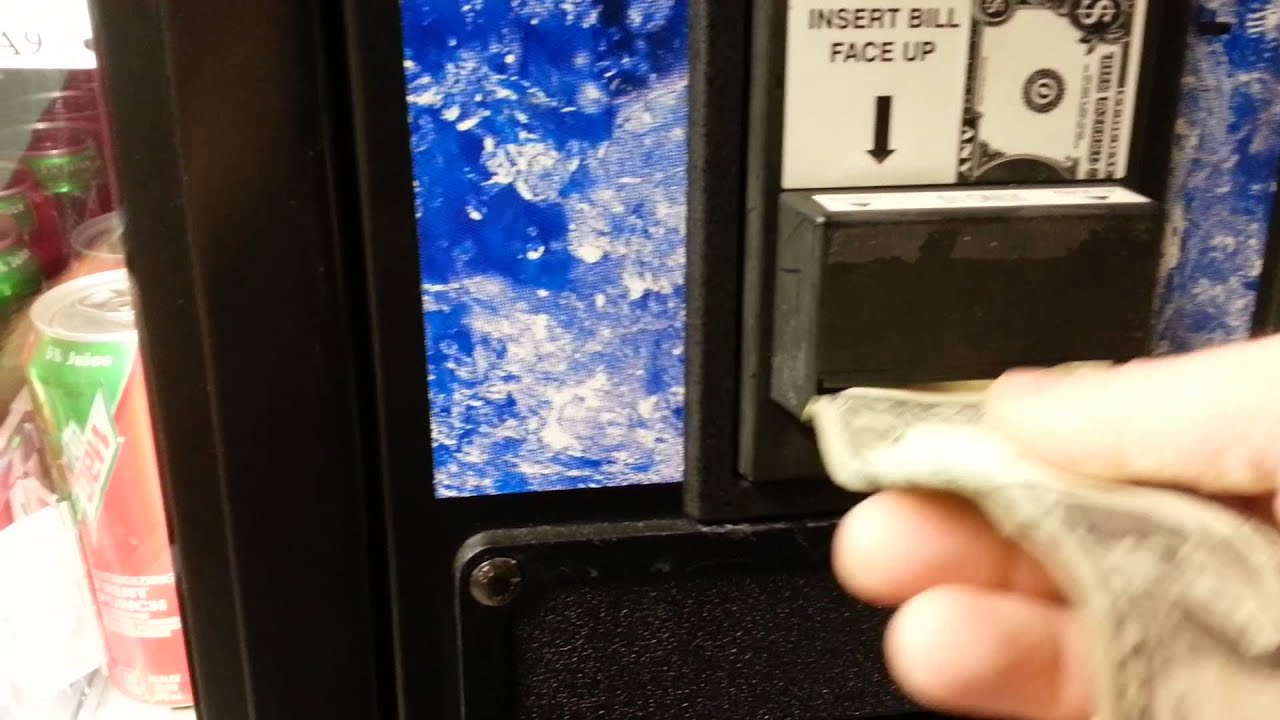 Buying a Starbucks Frappuccino from one of the new Pepsi vending machines @ work.