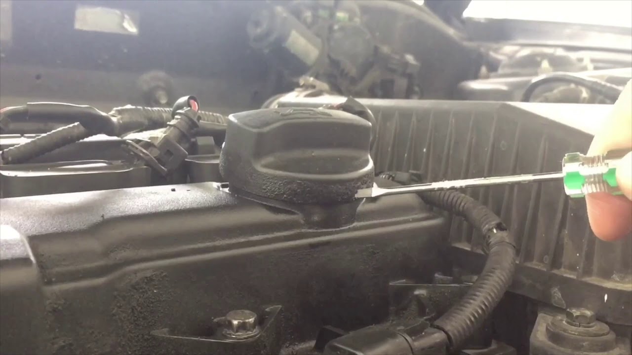 How to replace Proton Persona engine cam oil cap gasket seal