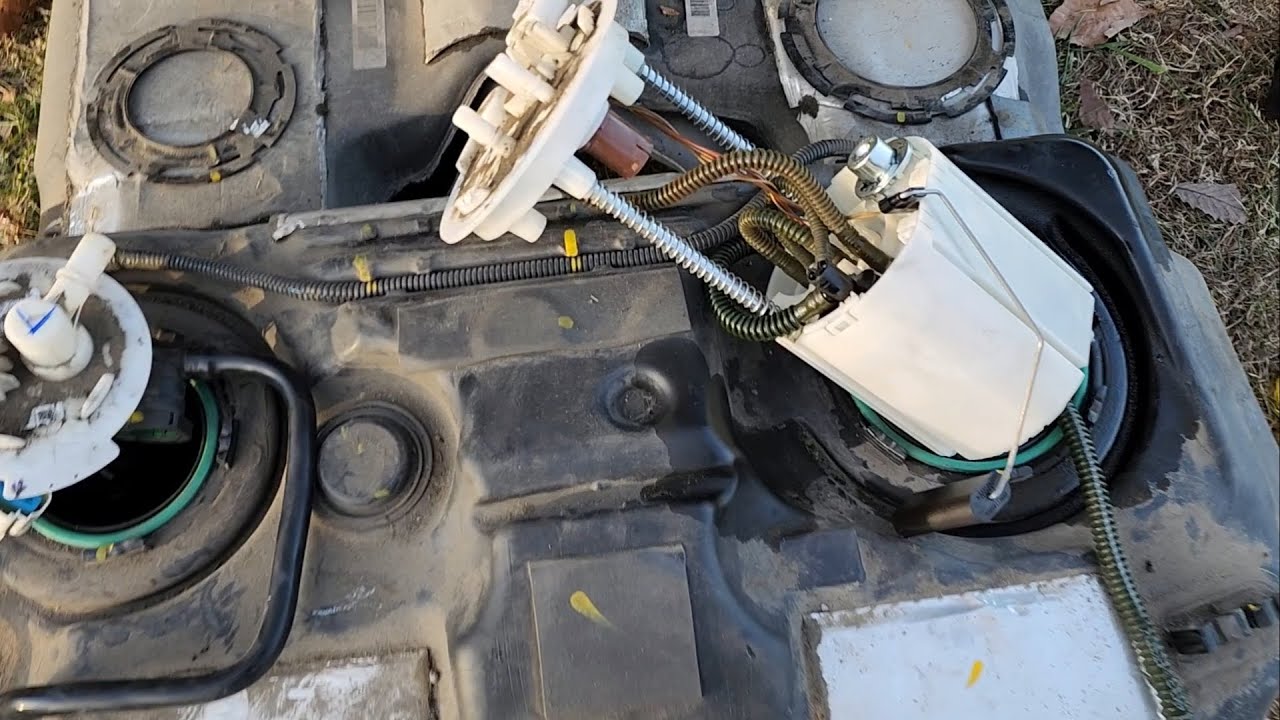 como cambiar bomba de gasolina de cadillac srx 2012 parte 1
