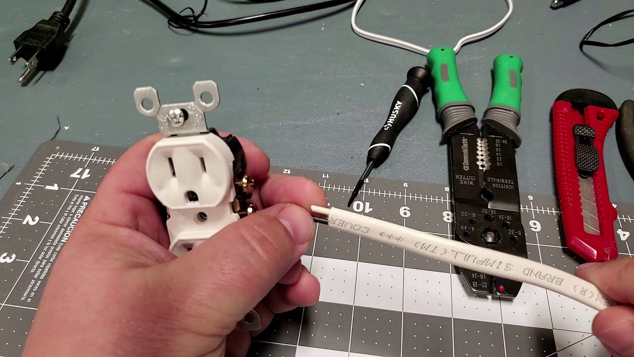 Teaching how to run wire through an attic and adding an outlet to the ceiling.