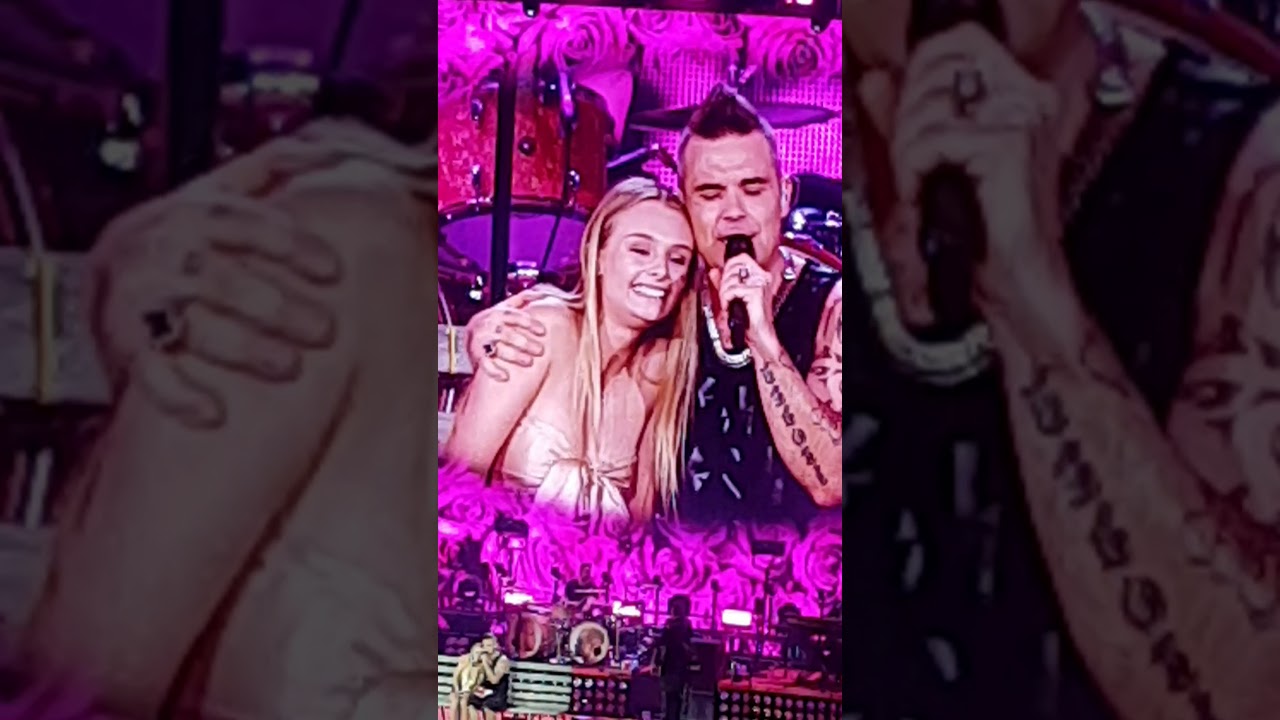 Robbie Williams funny moment with one of his fans.