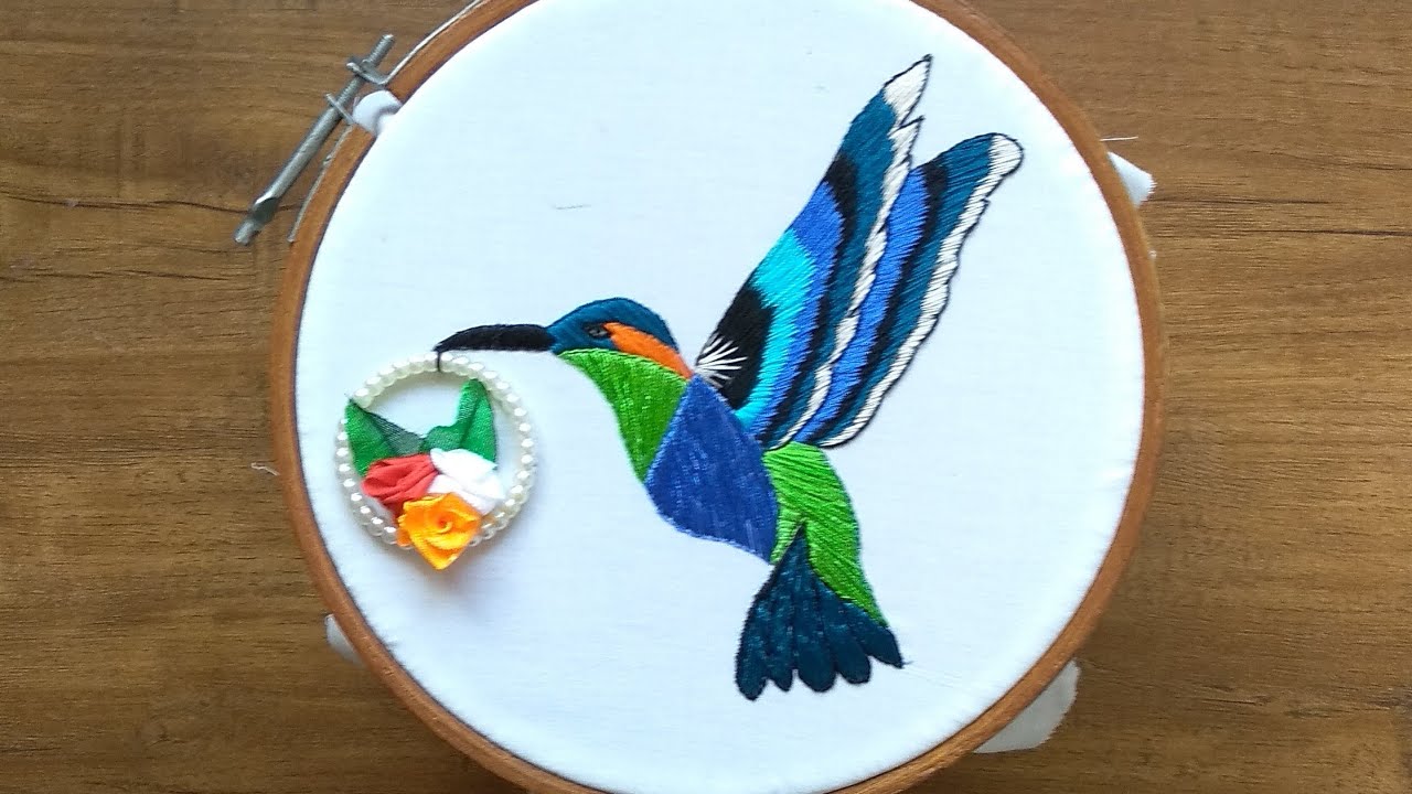 Beautiful hand embroidery humming bird design
