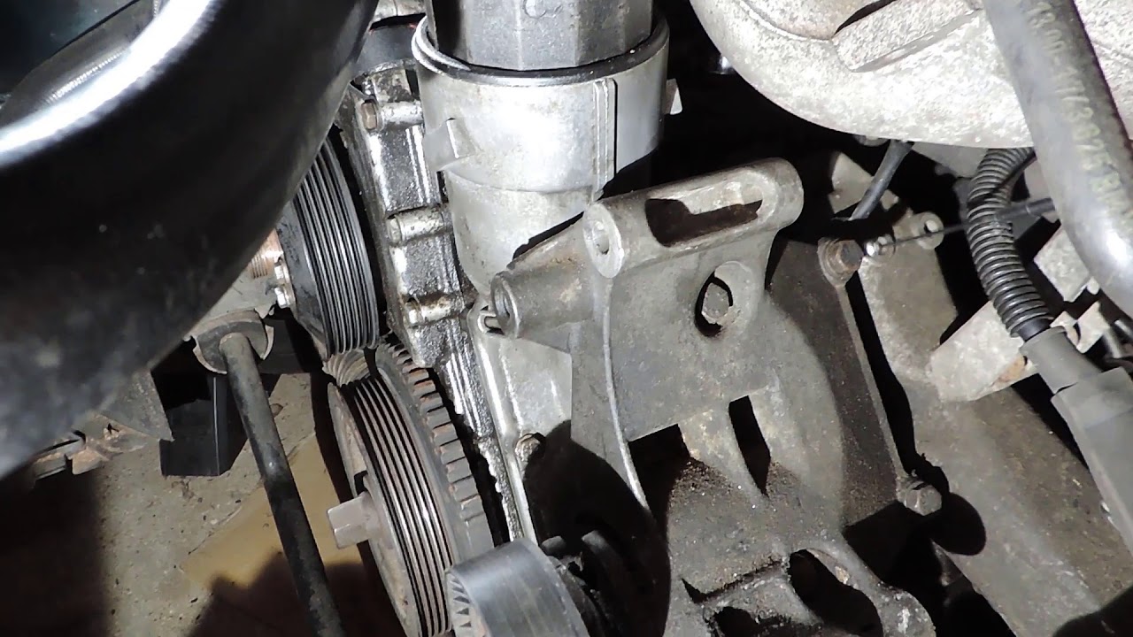 BMW E36 Changer le joint et la douille  du porte filtre à huile