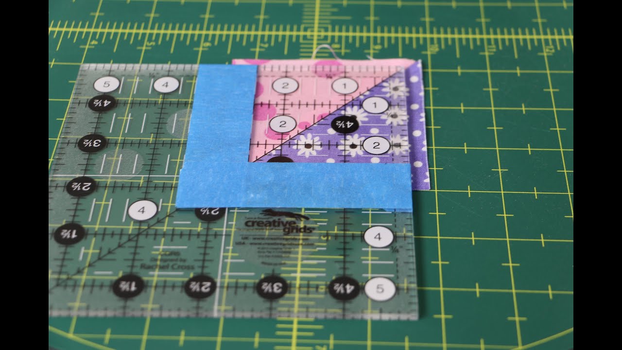 How to Square Up Half Square Triangles using a Creative Grids Square Up Ruler with Painter's Tape