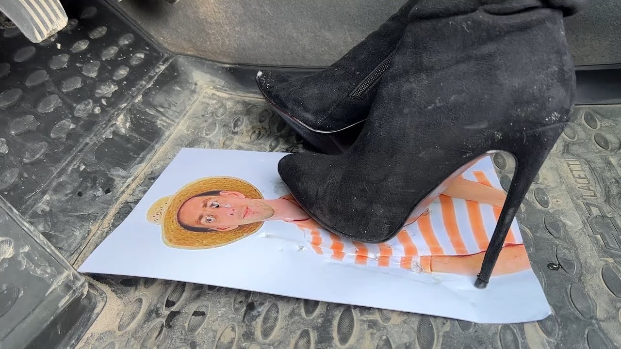 Crushed the picture with her high heels