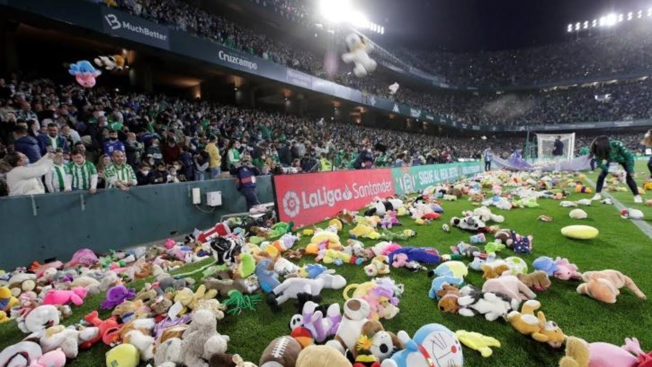 Real Betis Fans Throw Dolls to the Pitch during Laliga match against Atletico Club