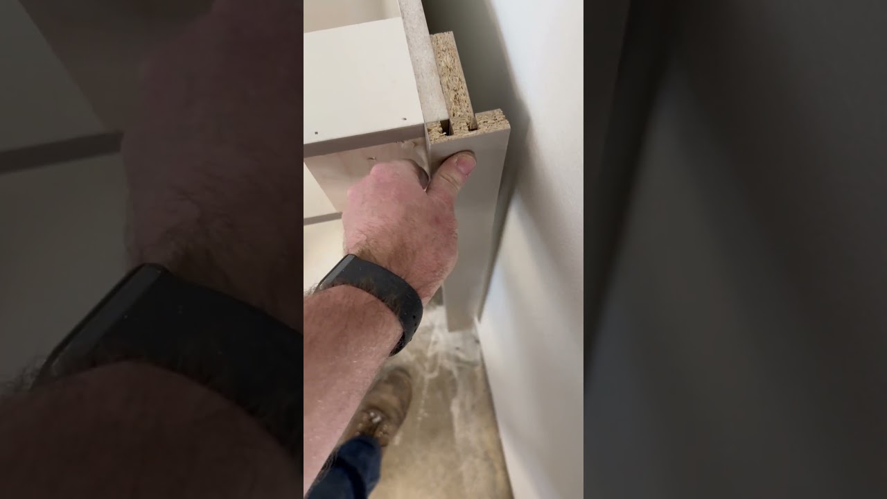 Two part &ldquo;L&rdquo; fillers. Very common to fit a kitchen tight to irregular walls