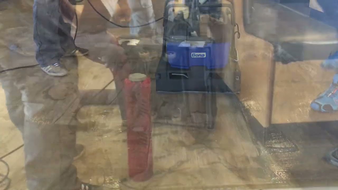 Cleaning and overcoating of existing resilient flooring.