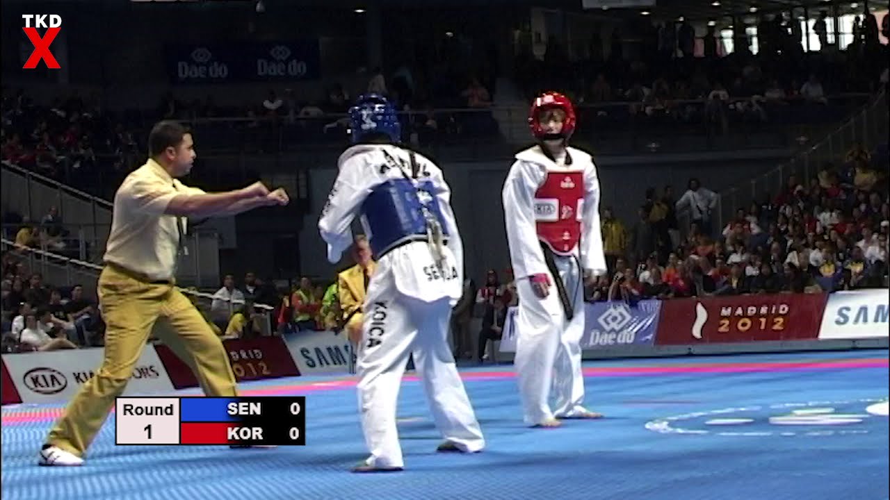 WTF Worlds 2005 Female Feather Weight Semi Final - Bineta Diedhiou (Senegal) v Sae Rom Kim (Korea)