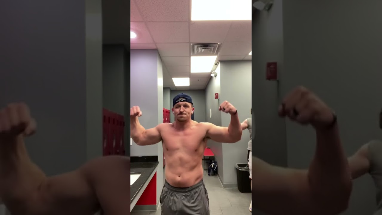 Mens locker room flexing