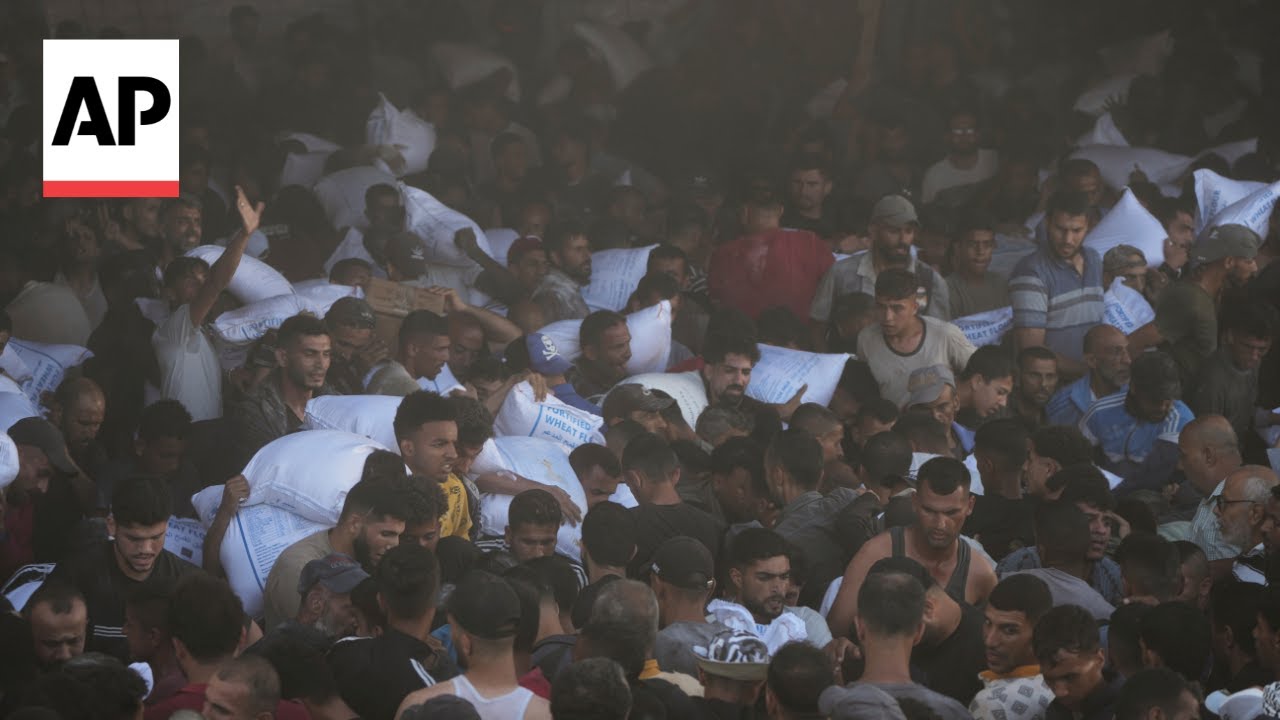Four Palestinians die after hundreds storm into a UN food warehouse in Gaza