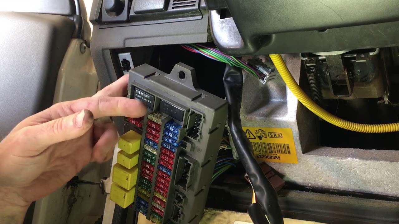 Removal of interior fuse panel in a Land Rover Discovery 2