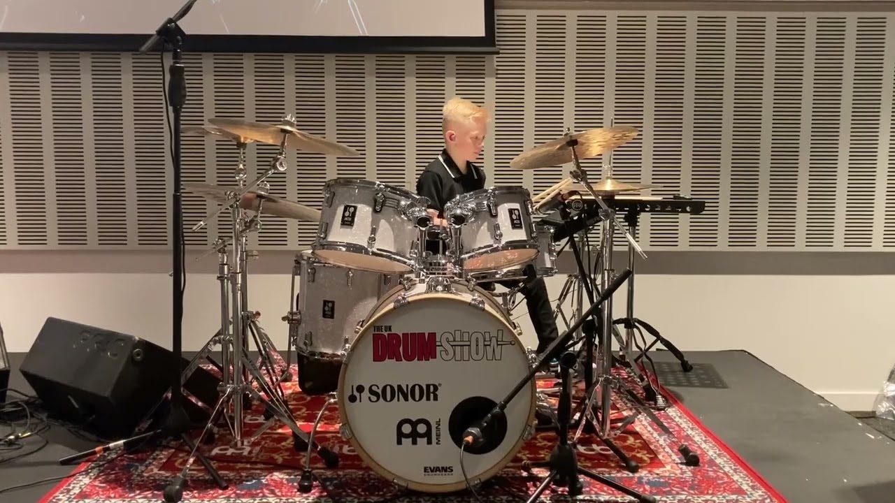 Ethan Smith performs at the UK Drum Show in 2024 aged 8 years old.