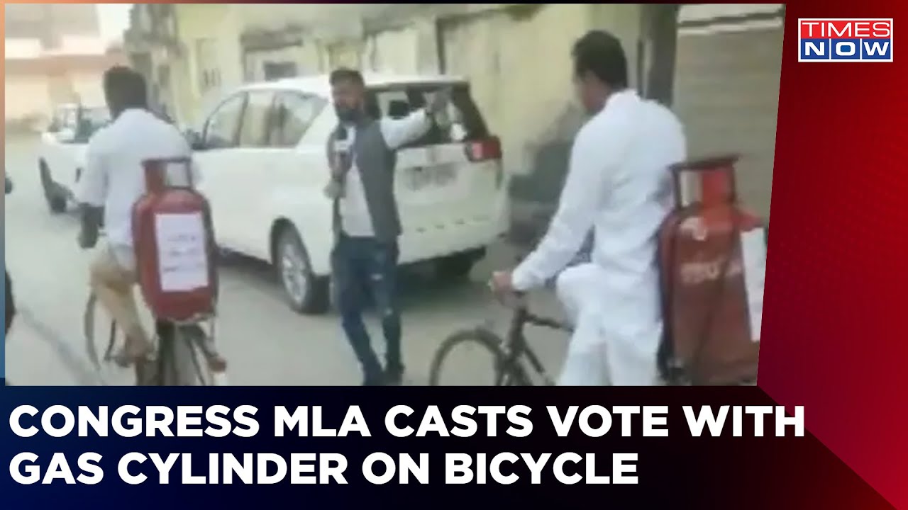 Gujarat Elections: Congress MLA Reaches Polling Booth With Gas Cylinder On Bicycle | English News