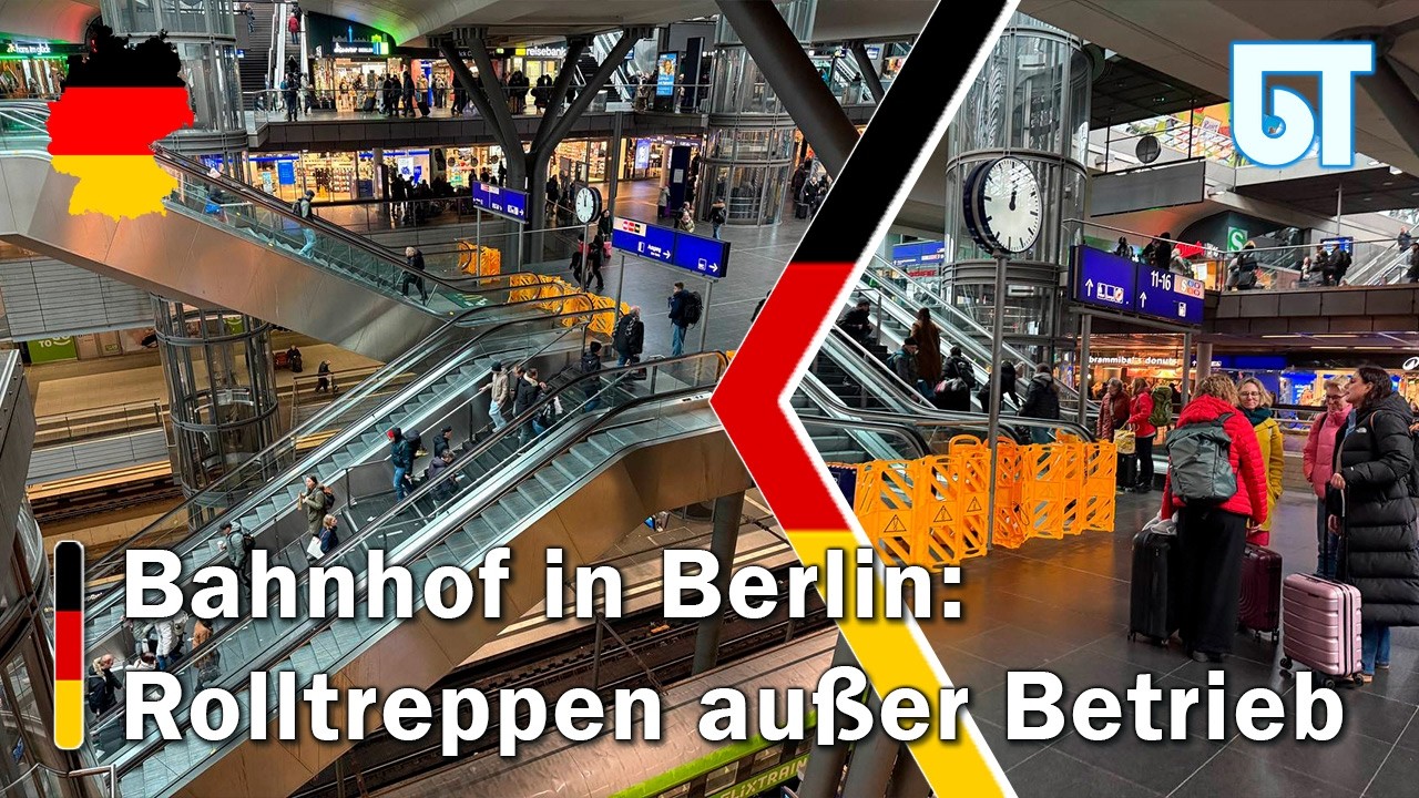 Berliner Bahnhof  „Blackout“ der Rolltreppen hält an, Fahrgäste gehen mit Gepäck über die Treppen