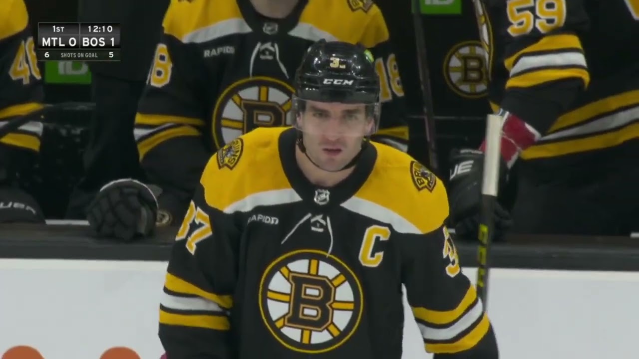 Marchand mugs Pitlick for late hit on Bergeron