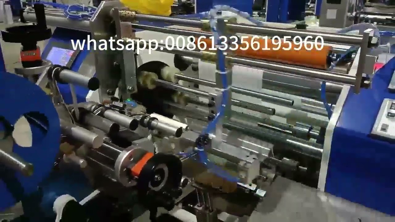 Automatic corelss paper rewinding machine with auotmatic label sticker