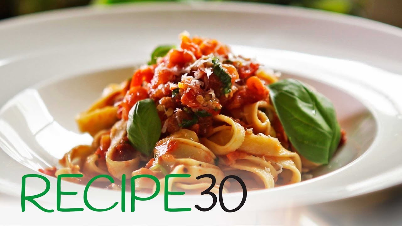 Pasta with fresh tomato, basil and freshly made fettuccine