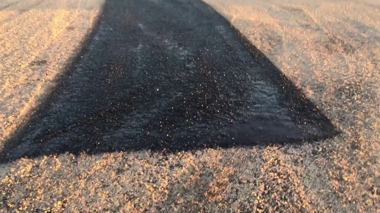 Tar & Chipping a Road