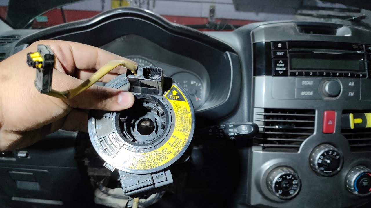 p1 Daihatsu terios airbag steering wheel clock spring removal.. ج1 فك دركسيون وشريط ايرباج تريوس