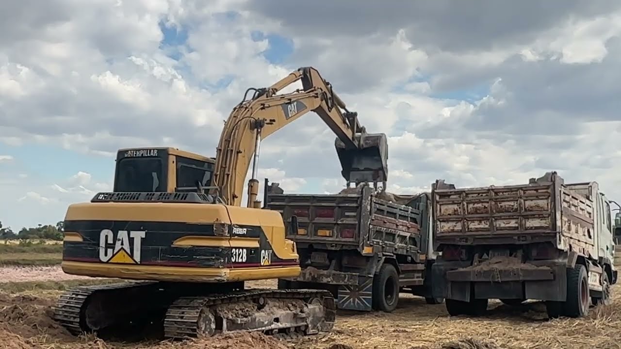 Caterpillar 312B Excavator Loading Trucks - Sotiriadis Mining Works #excavator #xcavator #truck