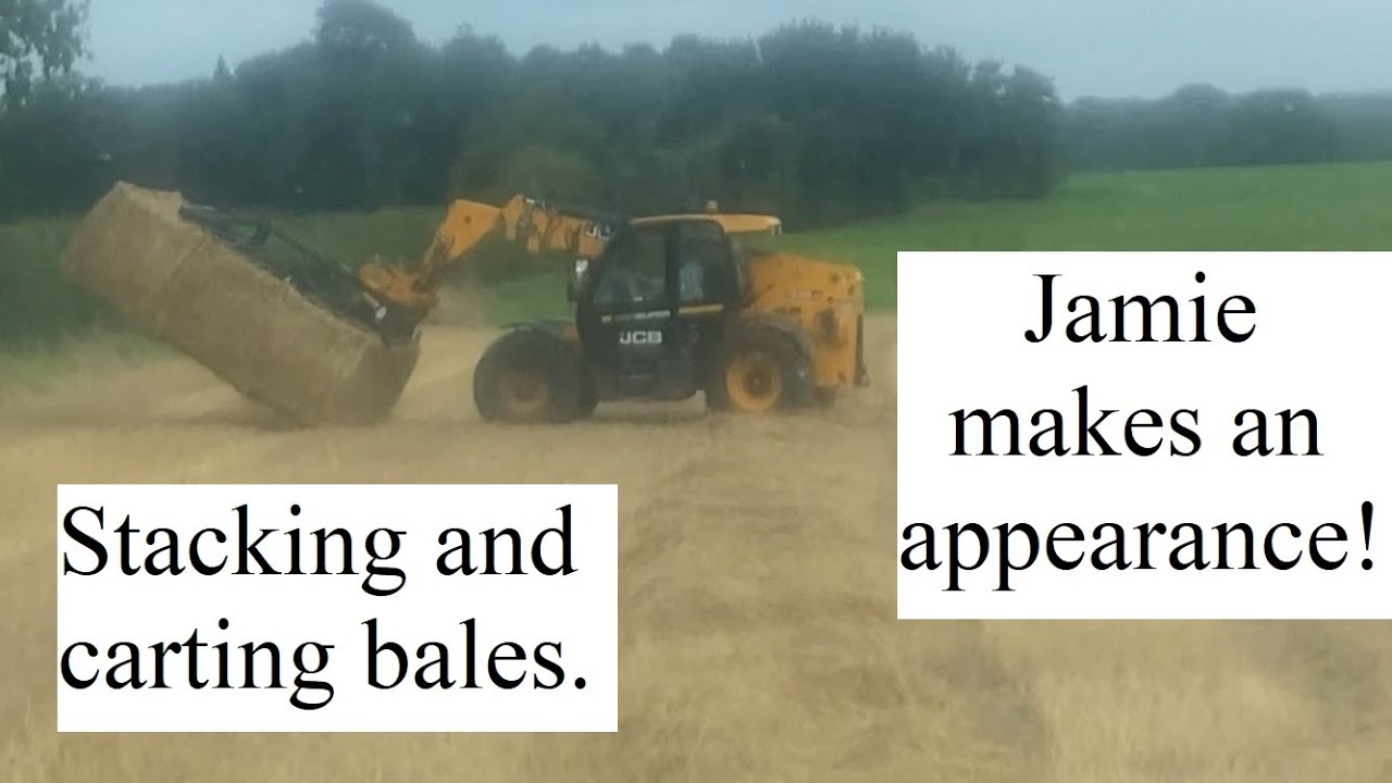 Stacking, and carting bales and Jamie makes an appearance!