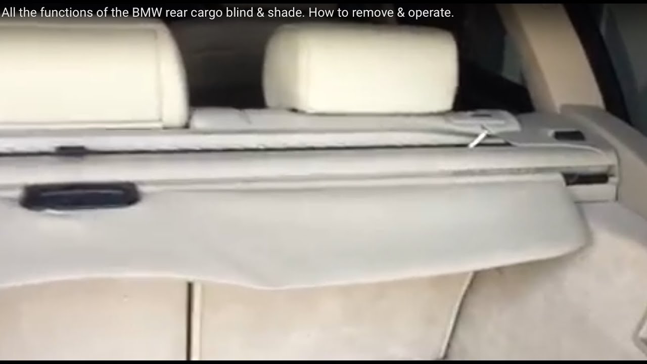 All the functions of the BMW rear cargo blind & shade. How to remove & operate.