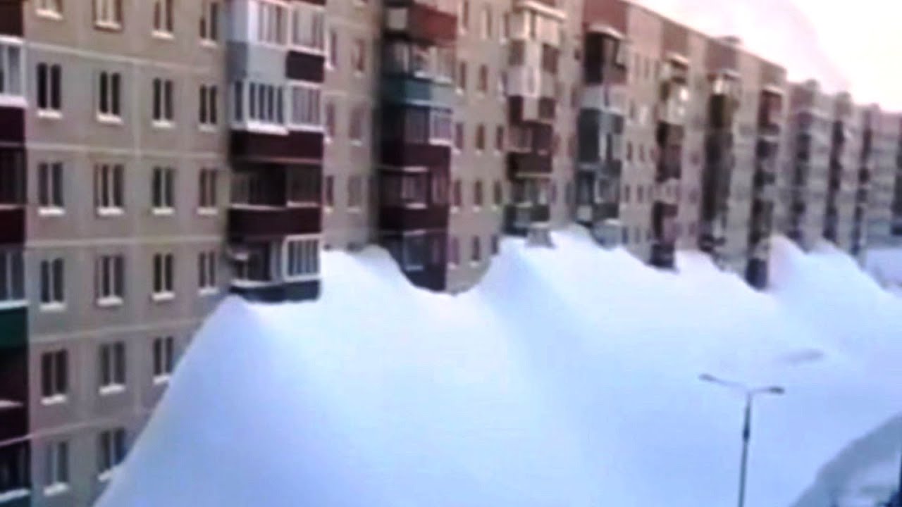 Russia's snow apocalypse has buried multi-story buildings