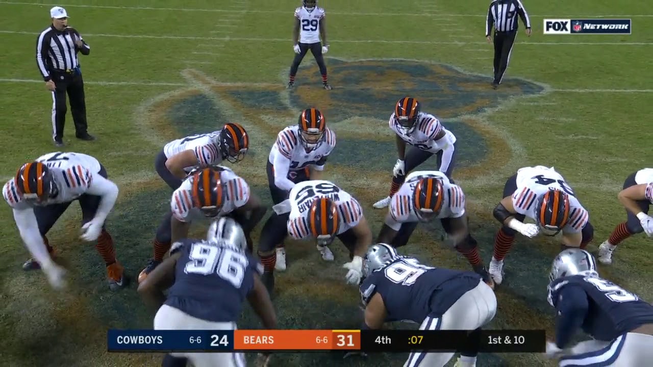 Tarik Cohen celebrates with a backflip as Mitchell Trubisky kneels down