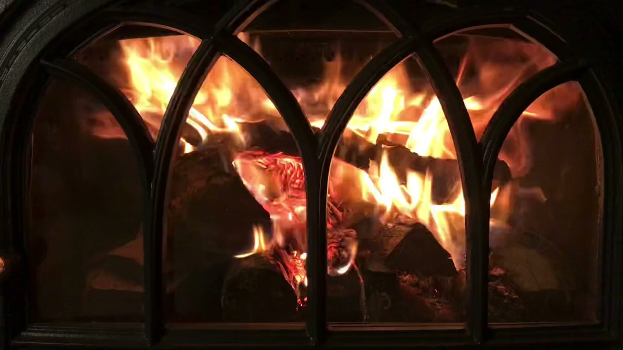 Top Down North South load in Jotul f400 castine with All Natural pine cone fire starter from yard.