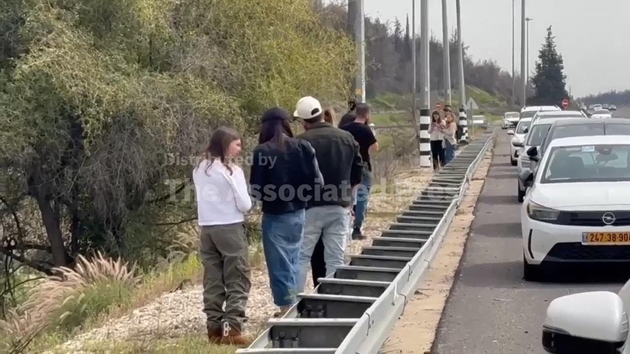 Israelis in cars instructed to stop and seek shelter by roadside amid air alert sirens