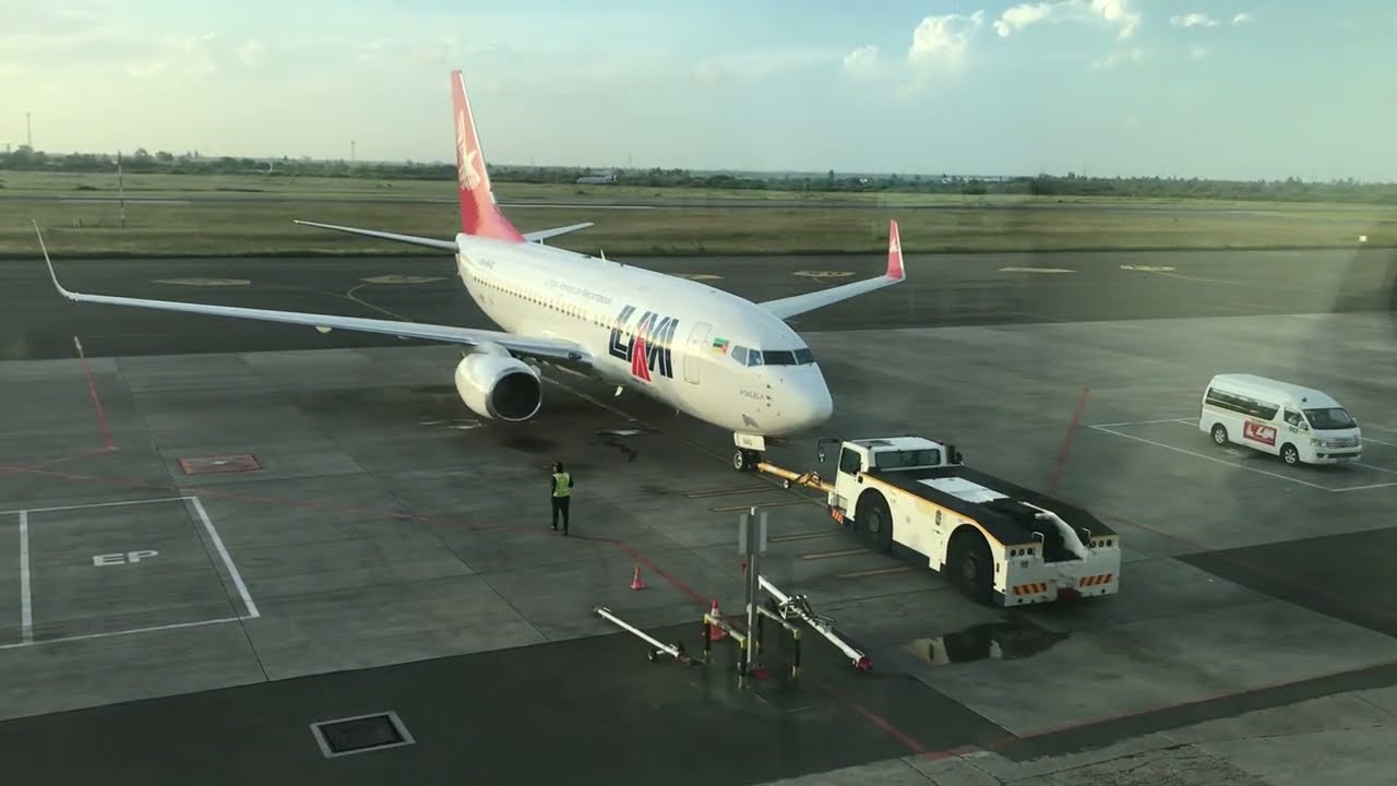 LAM BOEING 737-700 takeoff at MAPUTO INTERNATIONAL AIRPORT FQMA.