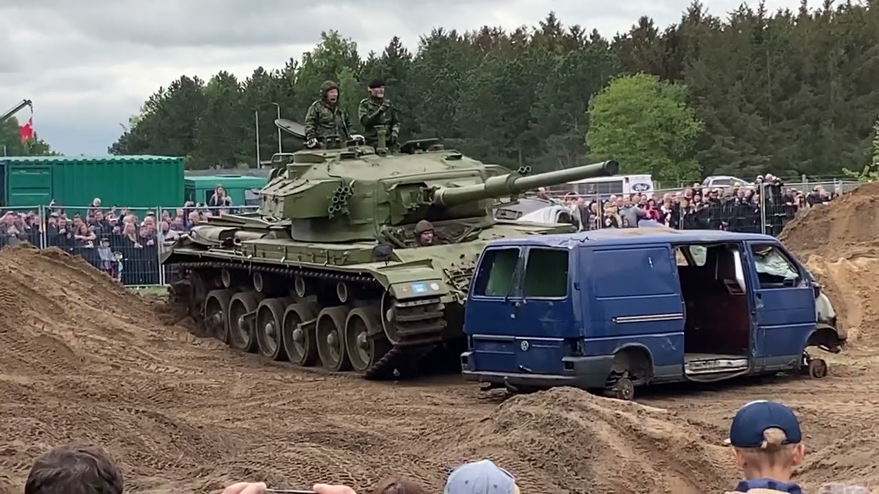 Centurion tank crushes cars