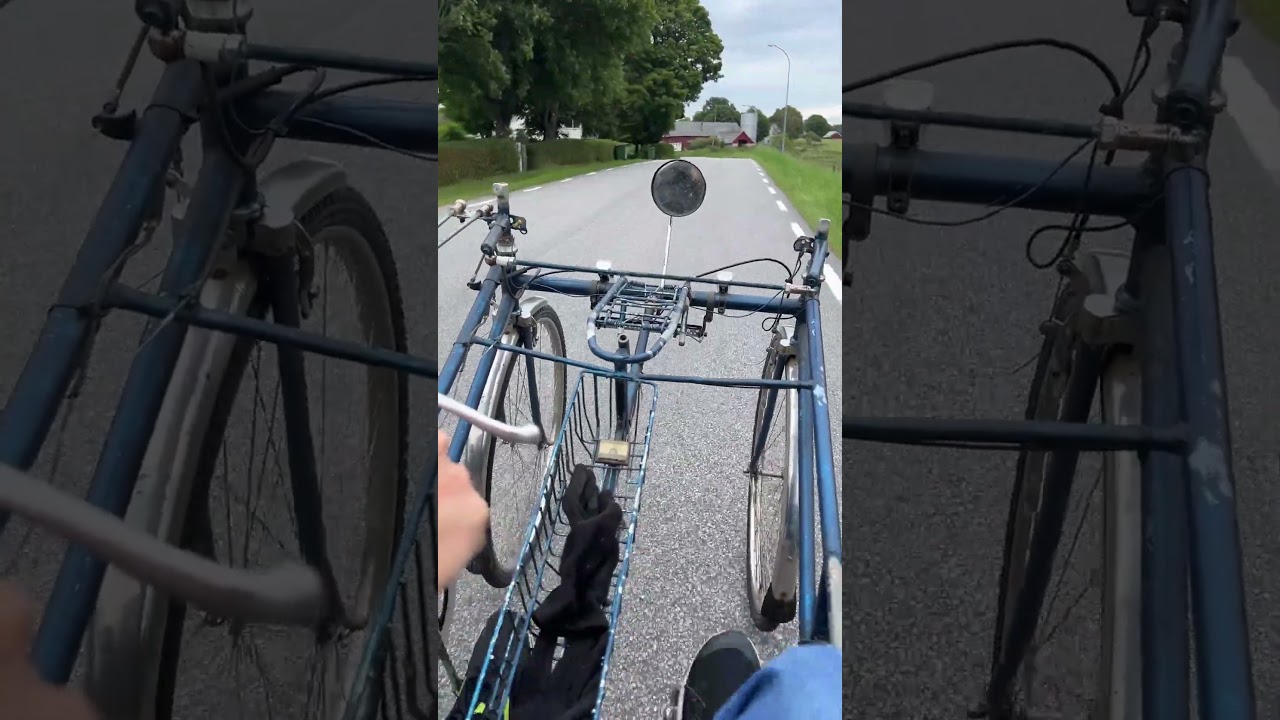 Side by side tandem bike from behind