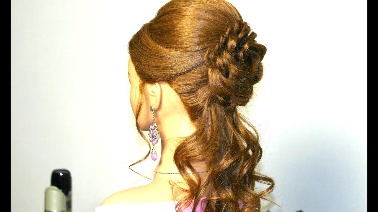 Prom hairstyle for long hair with braided flower.