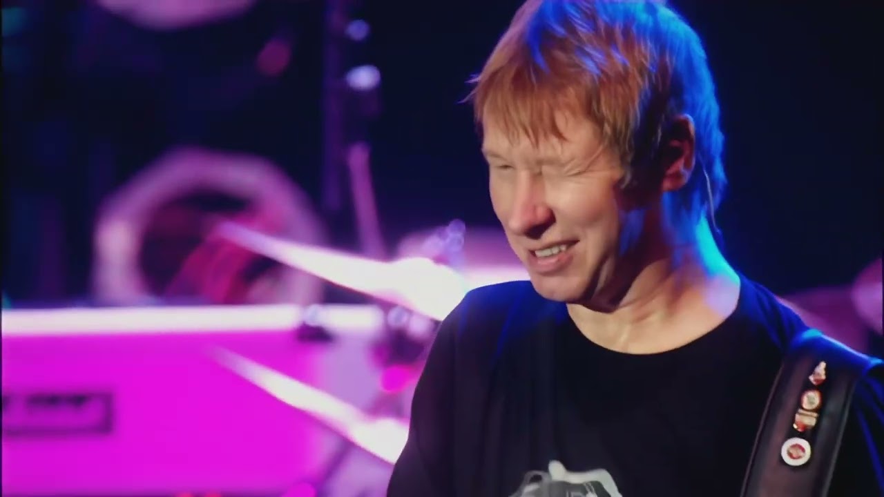 Status Quo - The Party Ain't Over Yet (Just Doin' It Live)