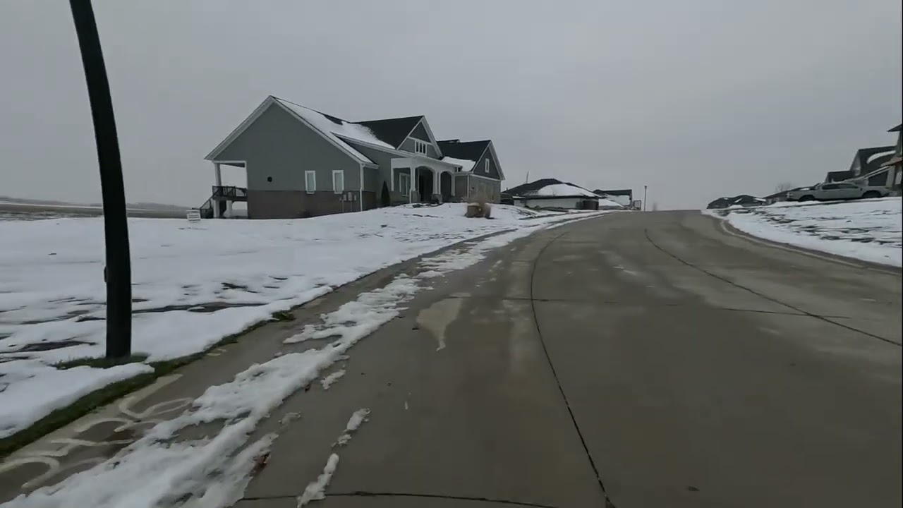 2025.12.a - A cool and overcast morning run through snow-covered neighborhoods.
