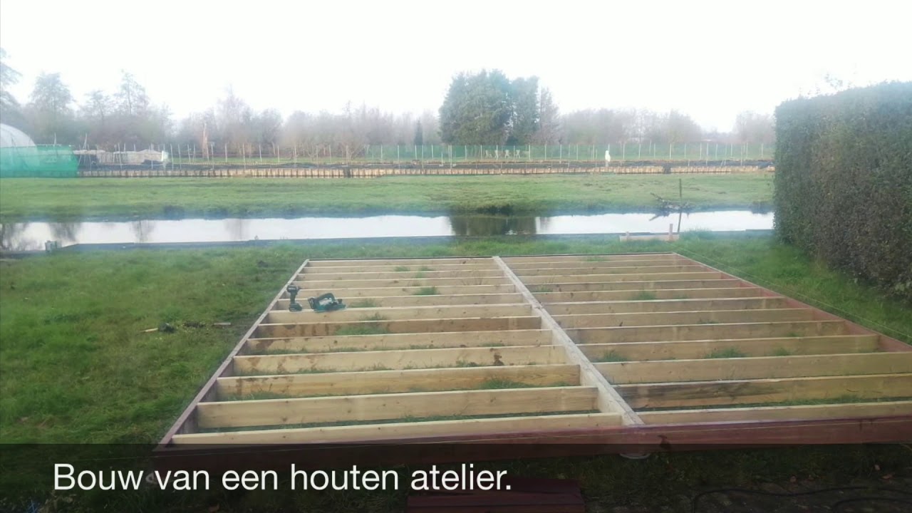 Bouw van een geïsoleerde blokhut.