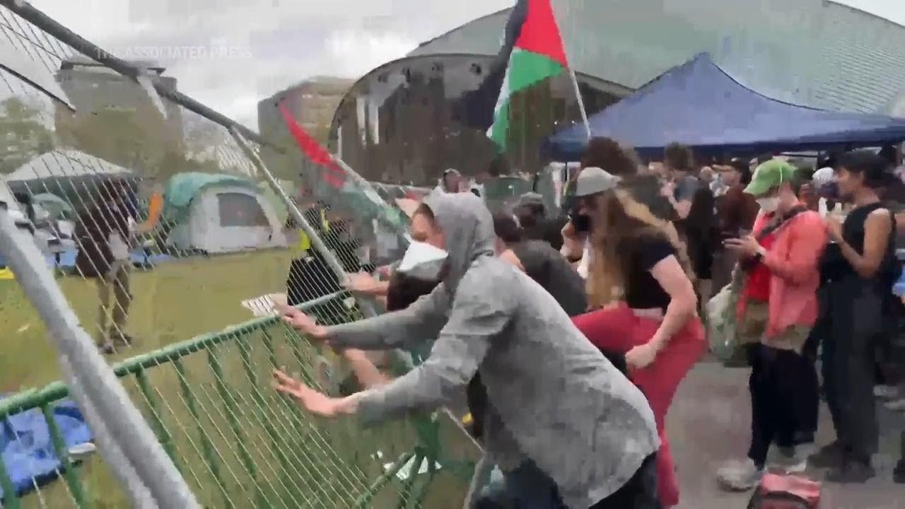 Pro-Palestinian protesters knock down barrier at MIT