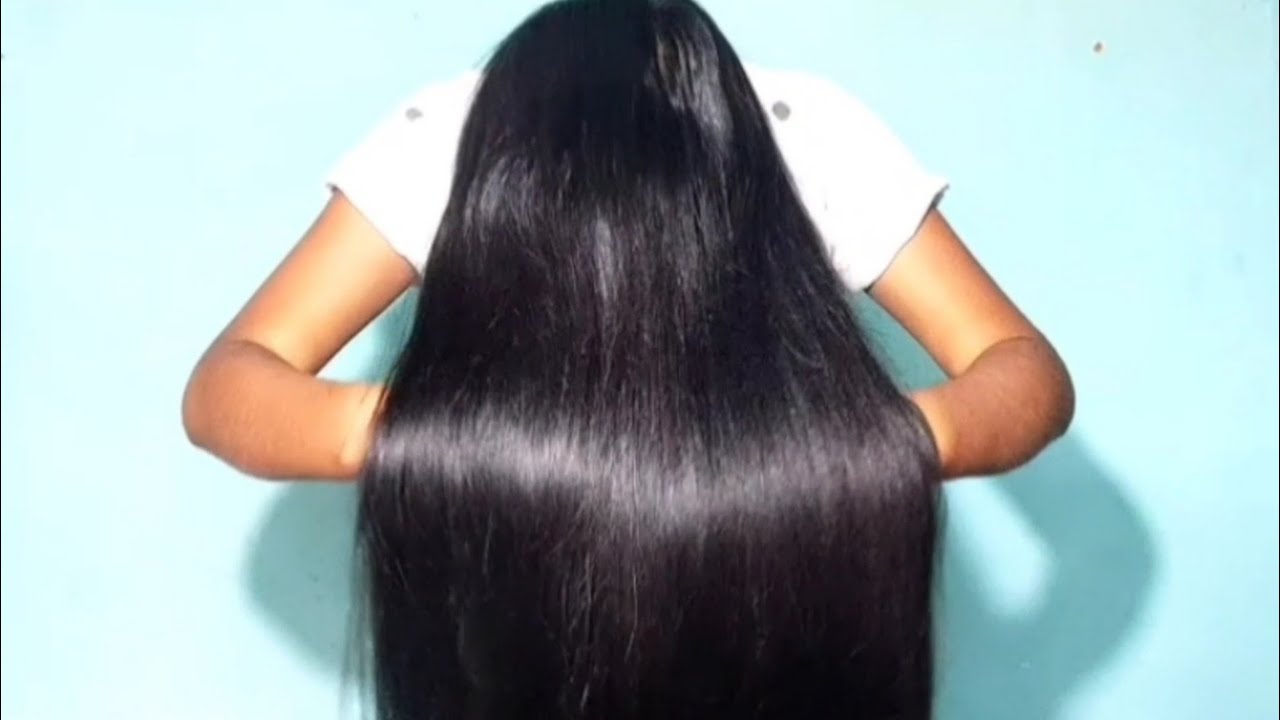 Natural black long hair playing and Brushing