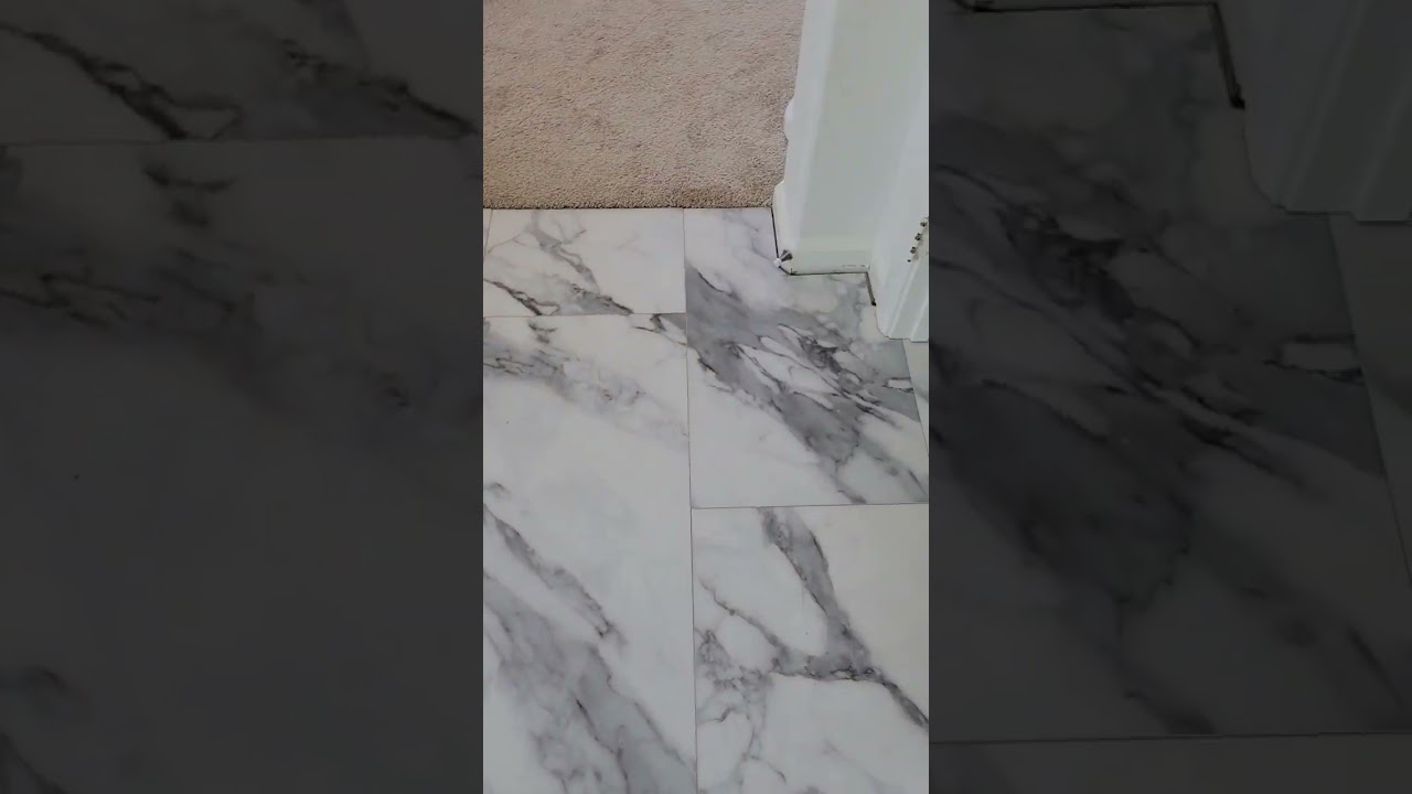 Elevate your space with Marko Holiday's  fake marble vinyl tiles! ✨