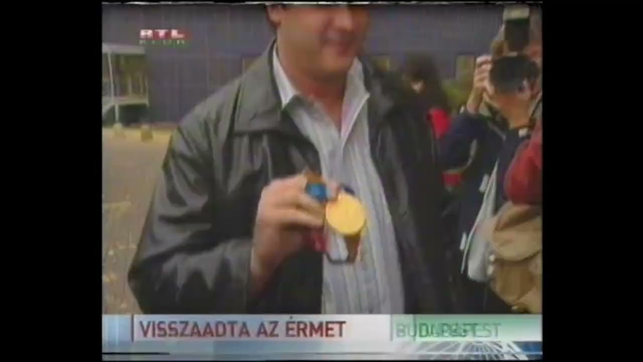 Visszaadta olimpiai aranyérmét Annus Adrián - Híradó, RTL Klub, 2004.10.24.  Teljes adás. Archív