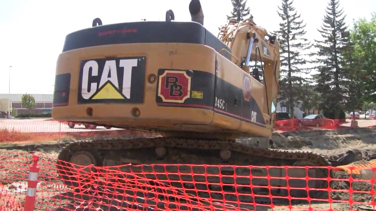 Cat 345CL Loading A Dump Truck