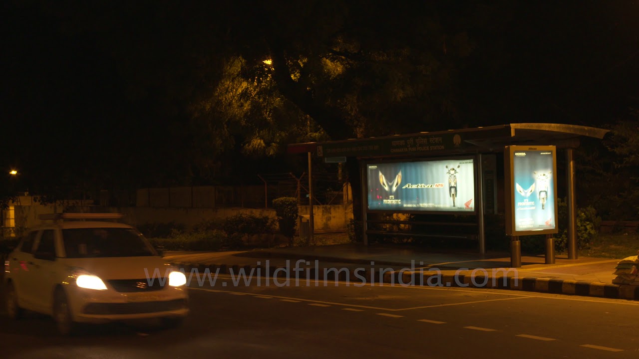 Police Station Chanakyapuri bus stop at night