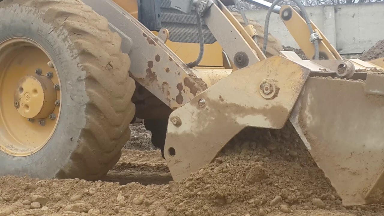 29 марта 2018 г.работа экскаватора-погрузчика Caterpillar 444E