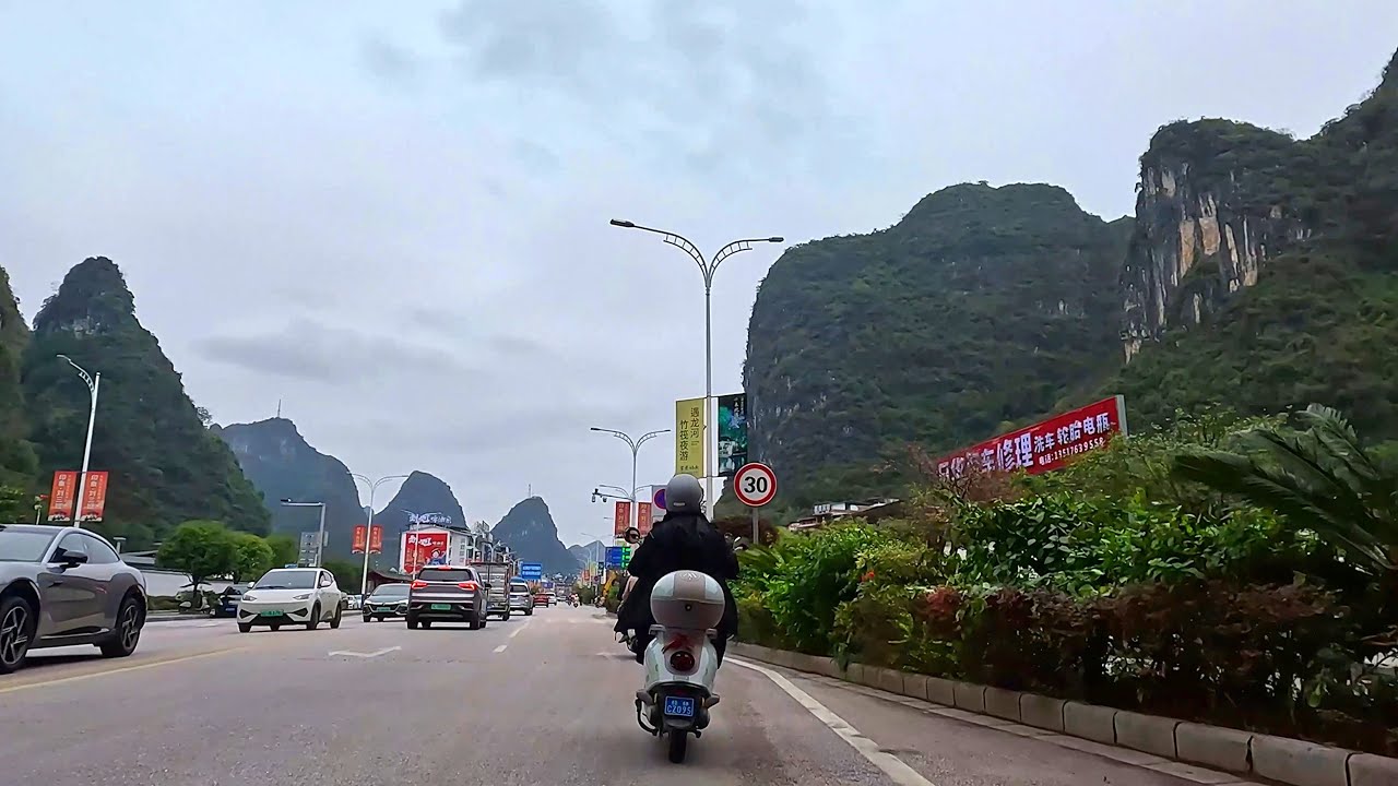 Go Local in Yangshuo on a Scooter from Country Road to Downtown Street