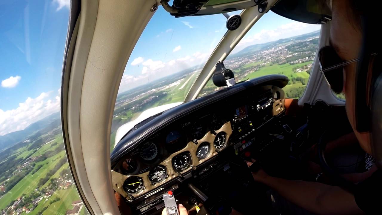Piper Archer II landing at Salzburg Airport - VFR with ATC