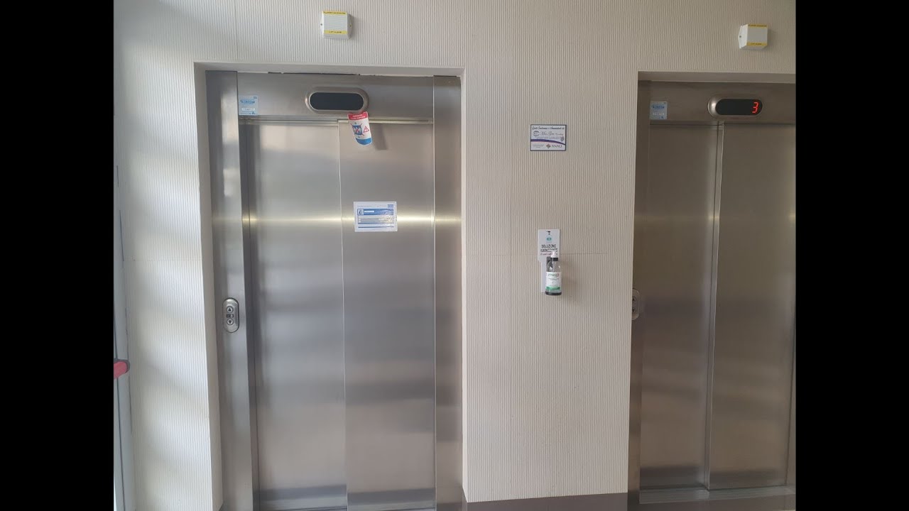 2 2015 Kone Monospace 500 MRL Traction Elevators, one broken@Irno Center Building, Salerno, Italy