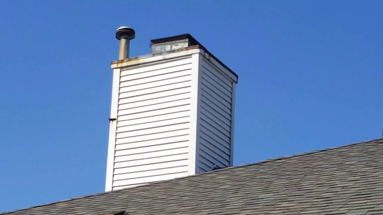 Rusted chimney chase cover.