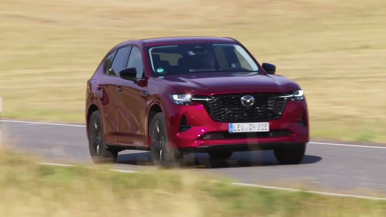 All-new 2022 Mazda CX-60 in Soul Red Crystal Driving in Germany